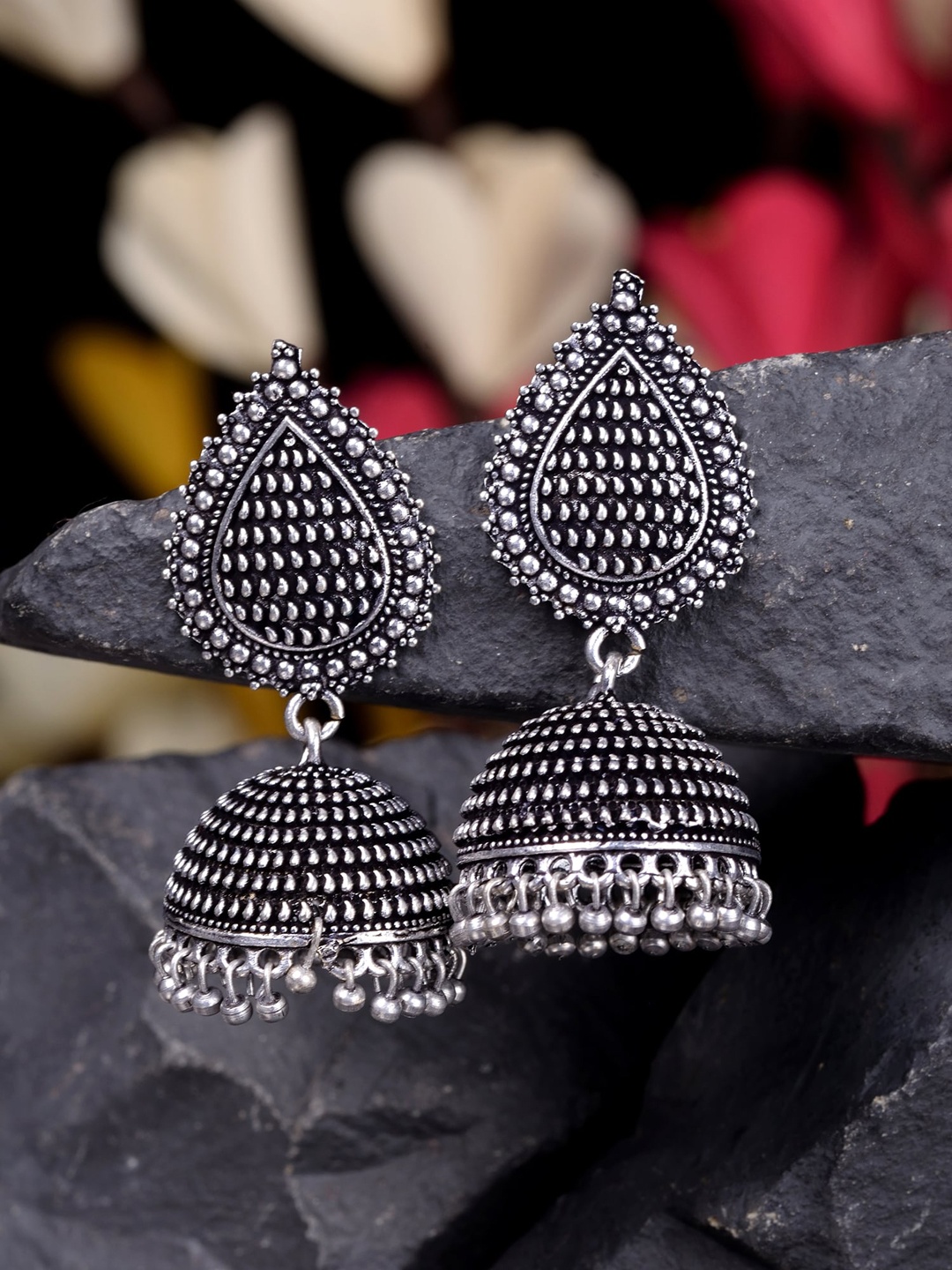 

Saraf RS Jewellery Silver-Toned Dome Shaped Jhumkas Earrings