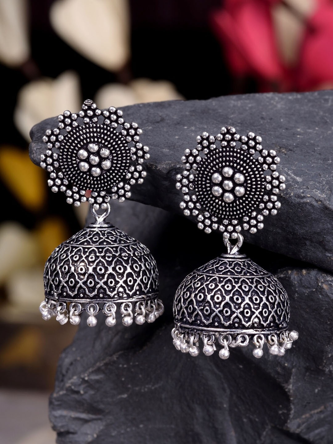 

Saraf RS Jewellery Silver-Toned Dome Shaped Jhumkas Earrings