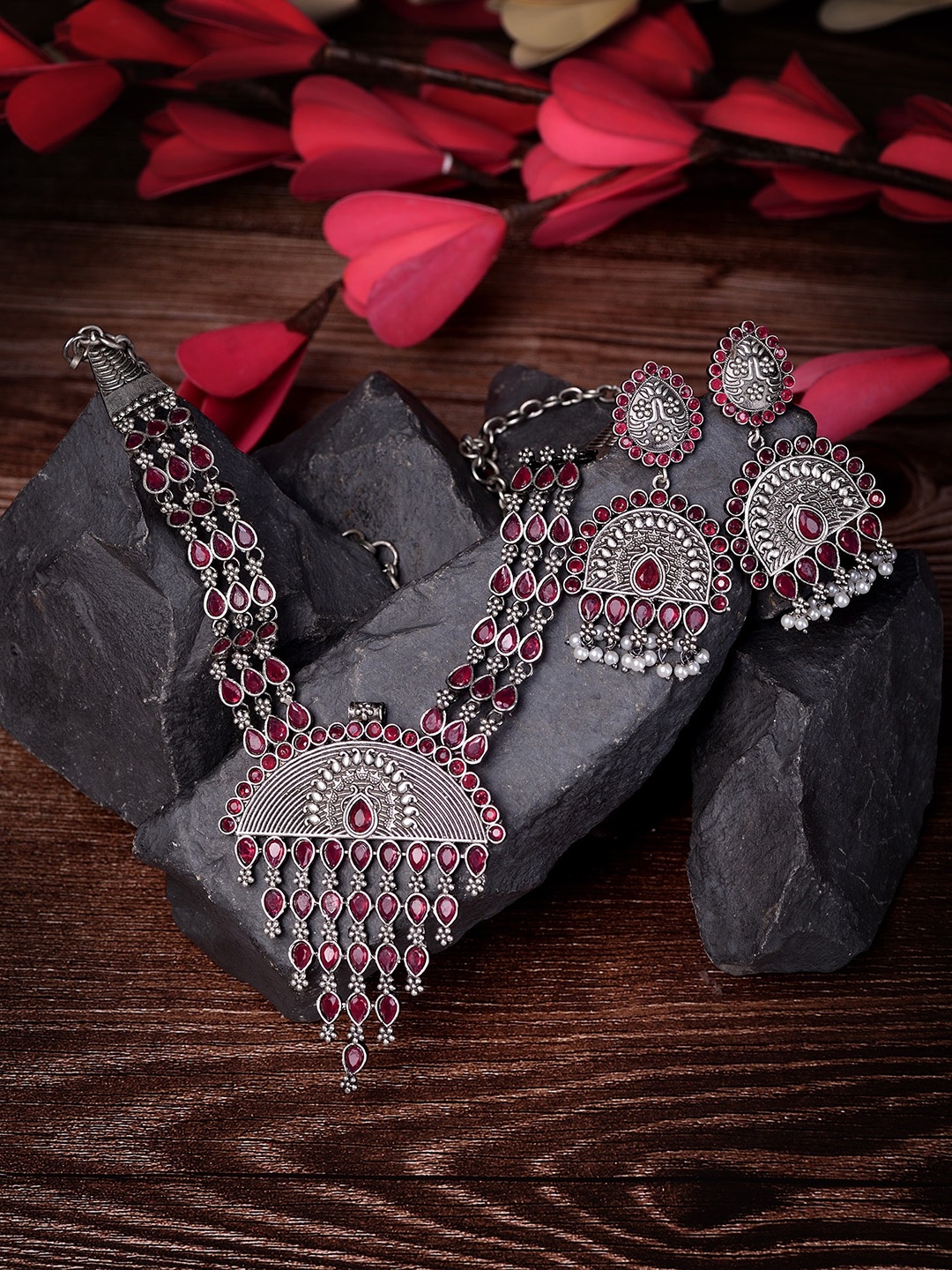 

Saraf RS Jewellery Oxidised Silver-Toned & Red Stone-Studded Tribal Jewellery Set