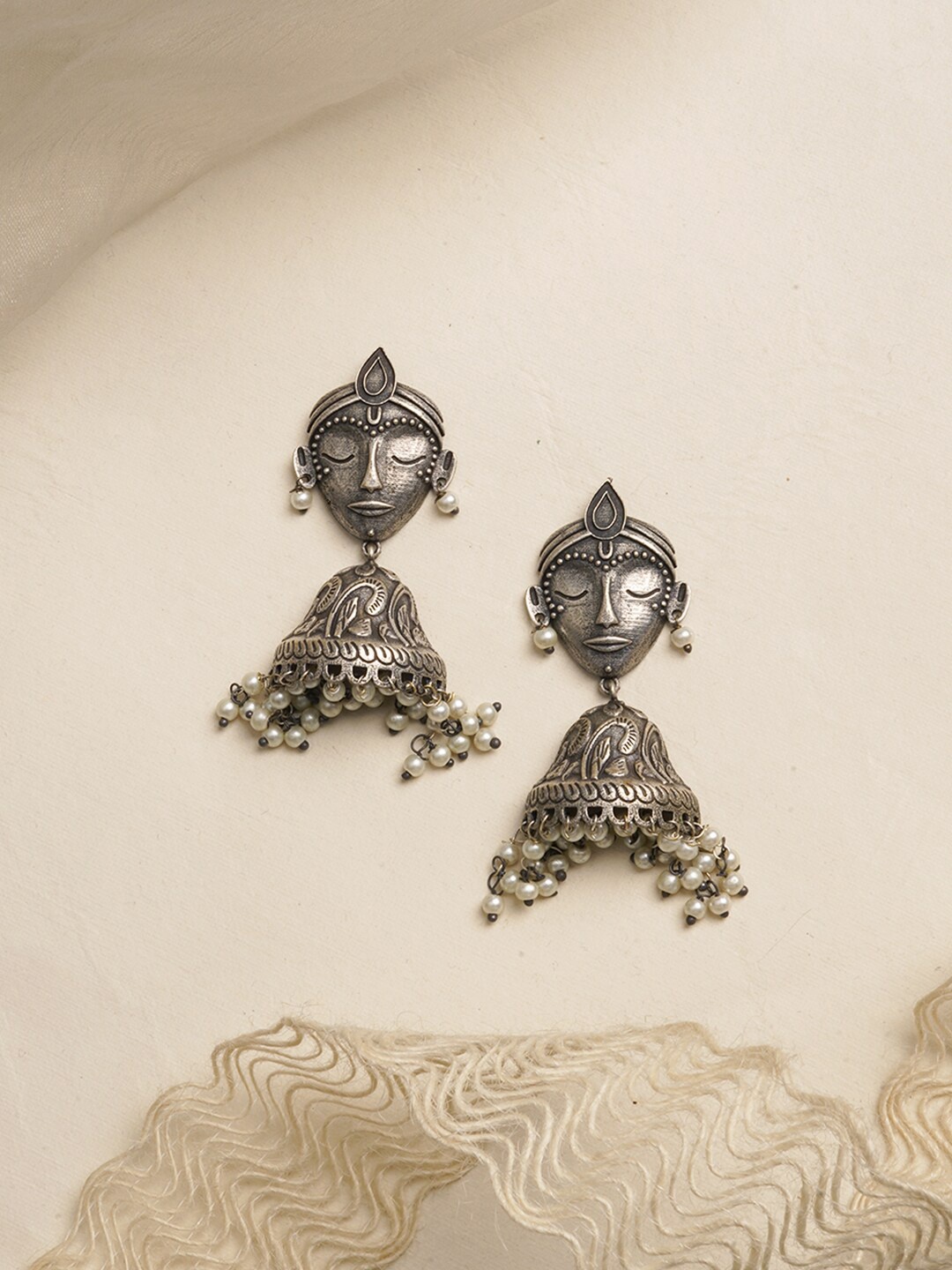 

TEEJH Silver-Toned Trishul Contemporary Oxidised Jhumkas Earrings