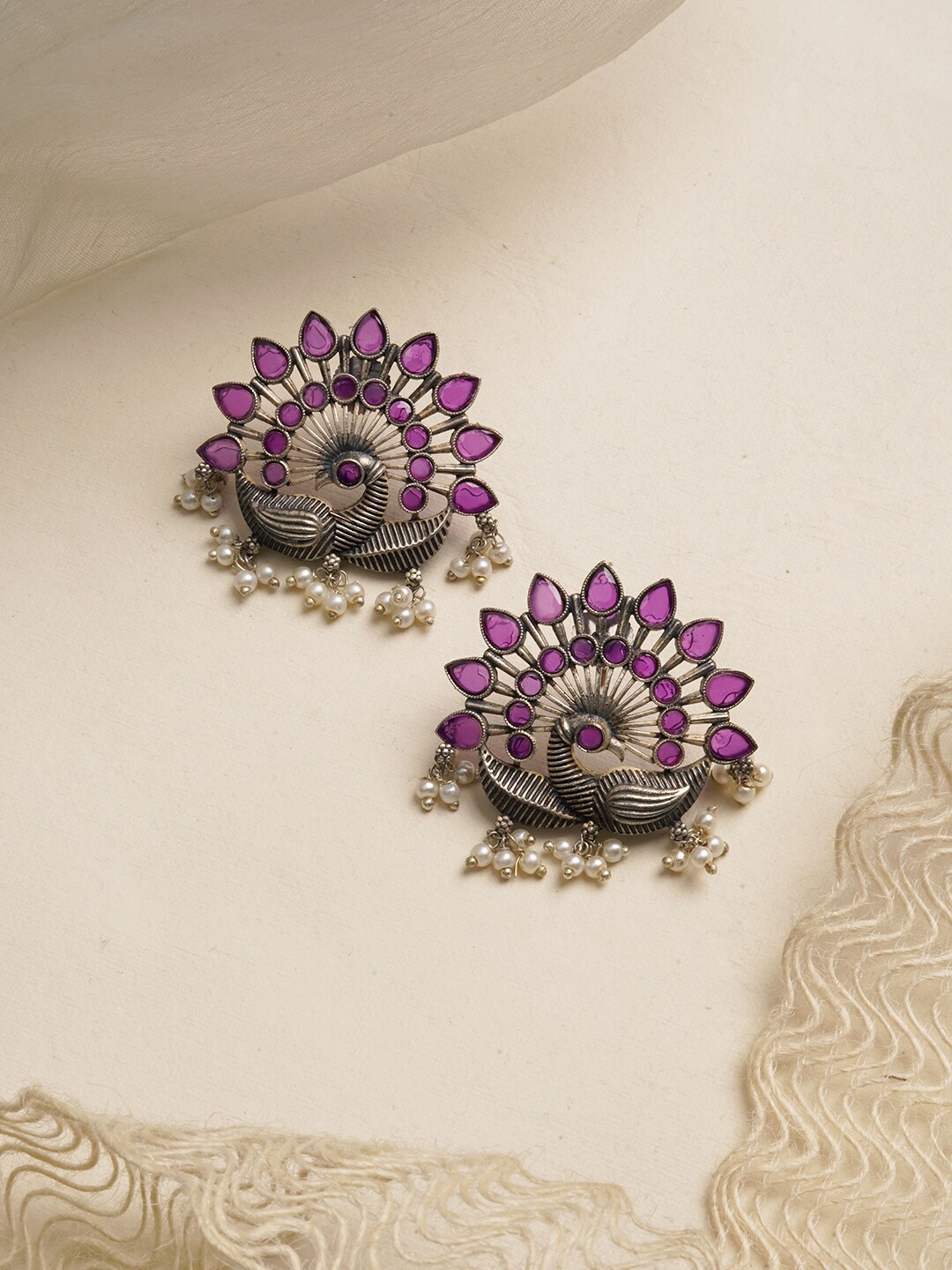 

TEEJH Silver-Toned & Purple Peacock Shaped Studs Earrings