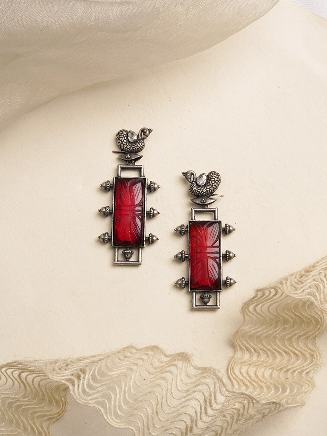 

TEEJH Silver-Plated & Red Oxidised Peacock Shaped Drop Earrings