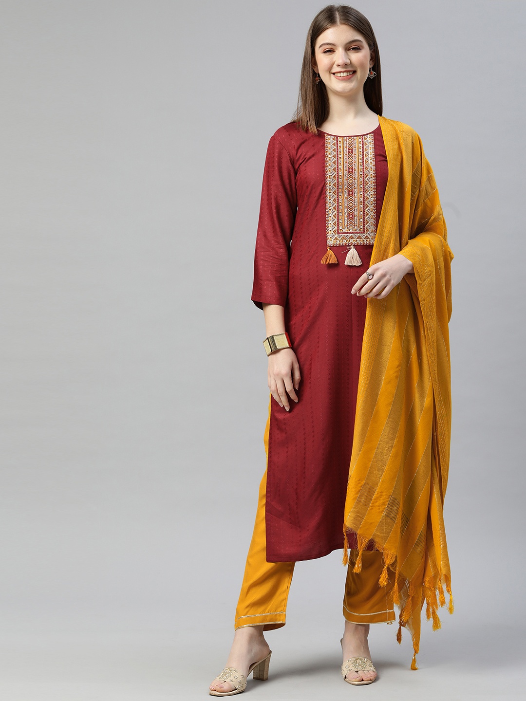 

SheWill Women Maroon Ethnic Motifs Embroidered Thread Work Dobby Kurta Trousers & Dupatta