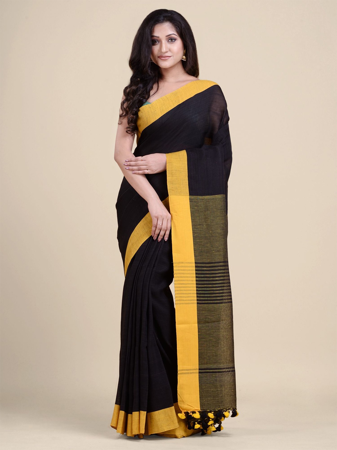 

Charukriti Black & Yellow Pure Linen Saree