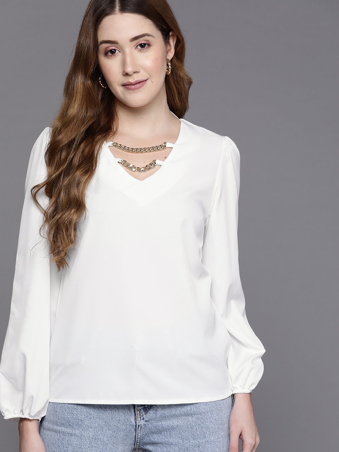 

JC Mode White Solid Stylised V-Neck Top