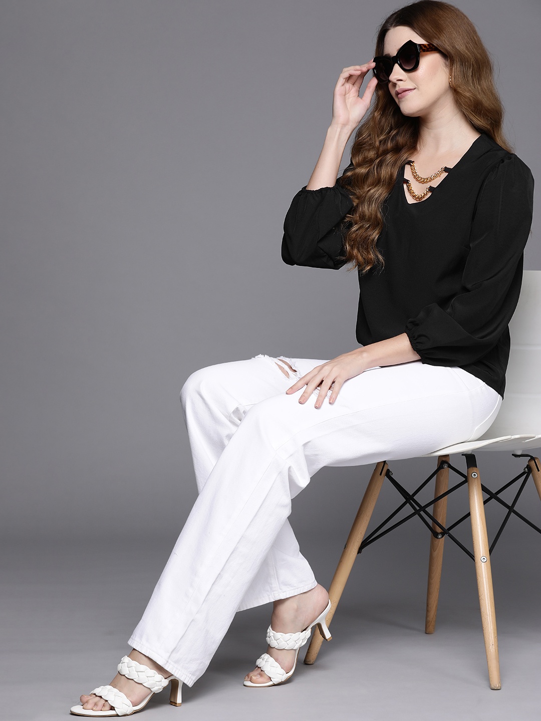 

JC Mode Black Solid Stylised V-Neck Top