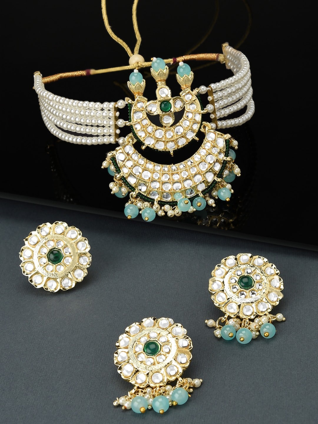 

Zaveri Pearls Gold-Plated White & Blue Kundan Studded & Beaded Jewellery Set