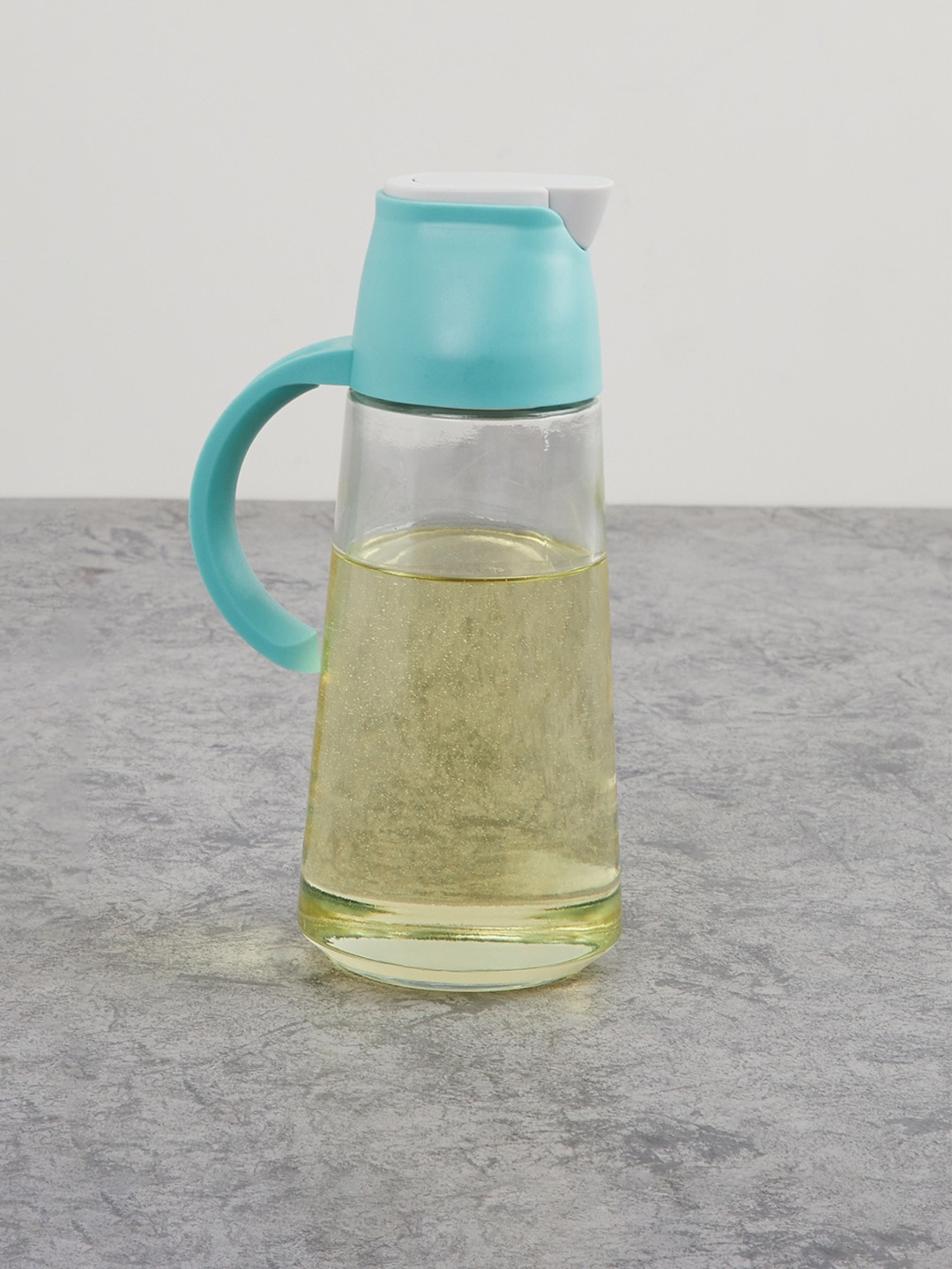 

Home Centre Teal Blue Glass Oil Bottle 630 Ml