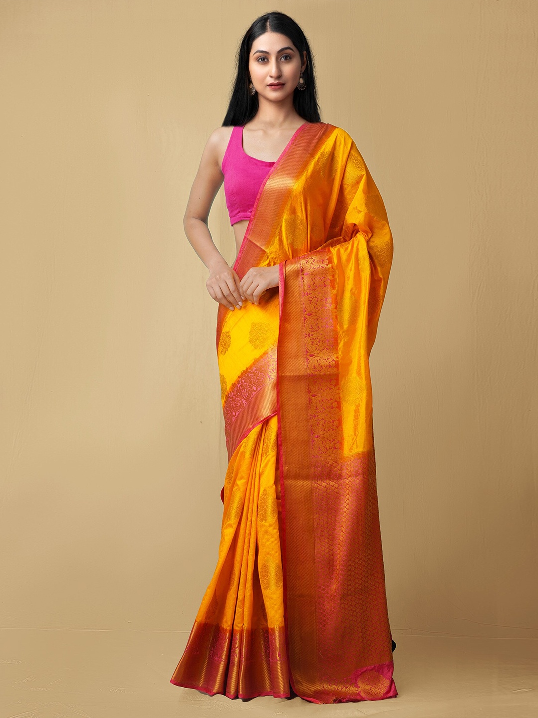 

Unnati Silks Yellow & Magenta Ethnic Motifs Zari Silk Blend Dyed Kanjeevaram Saree