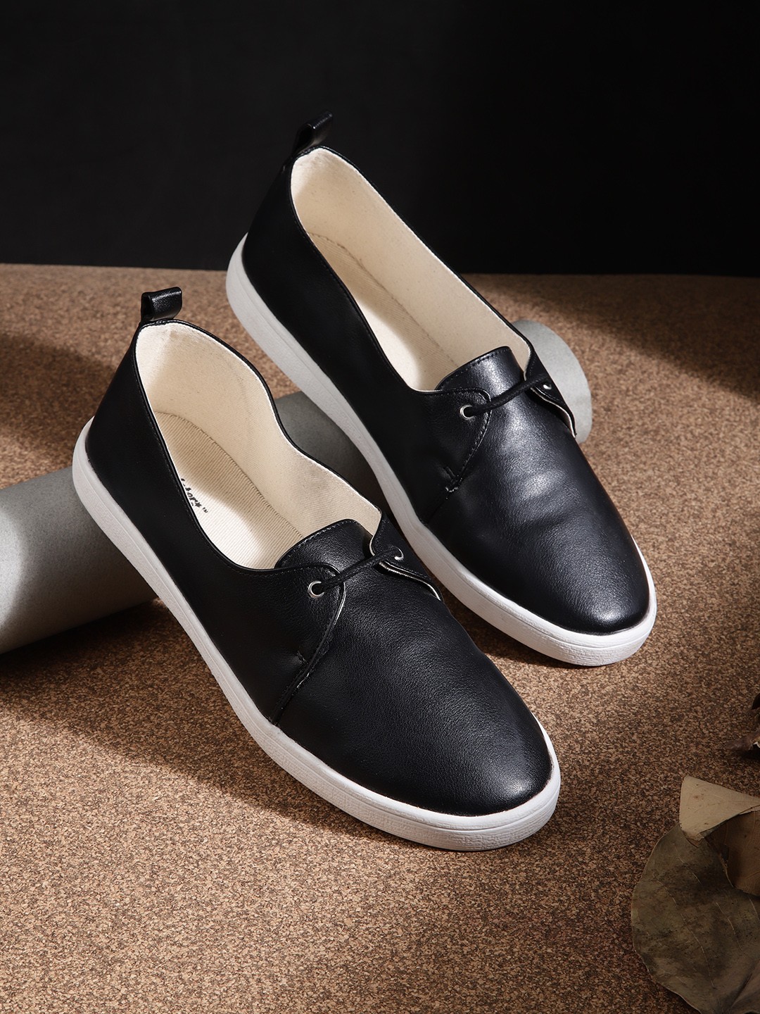 

Roadster Women Black Solid Sneakers