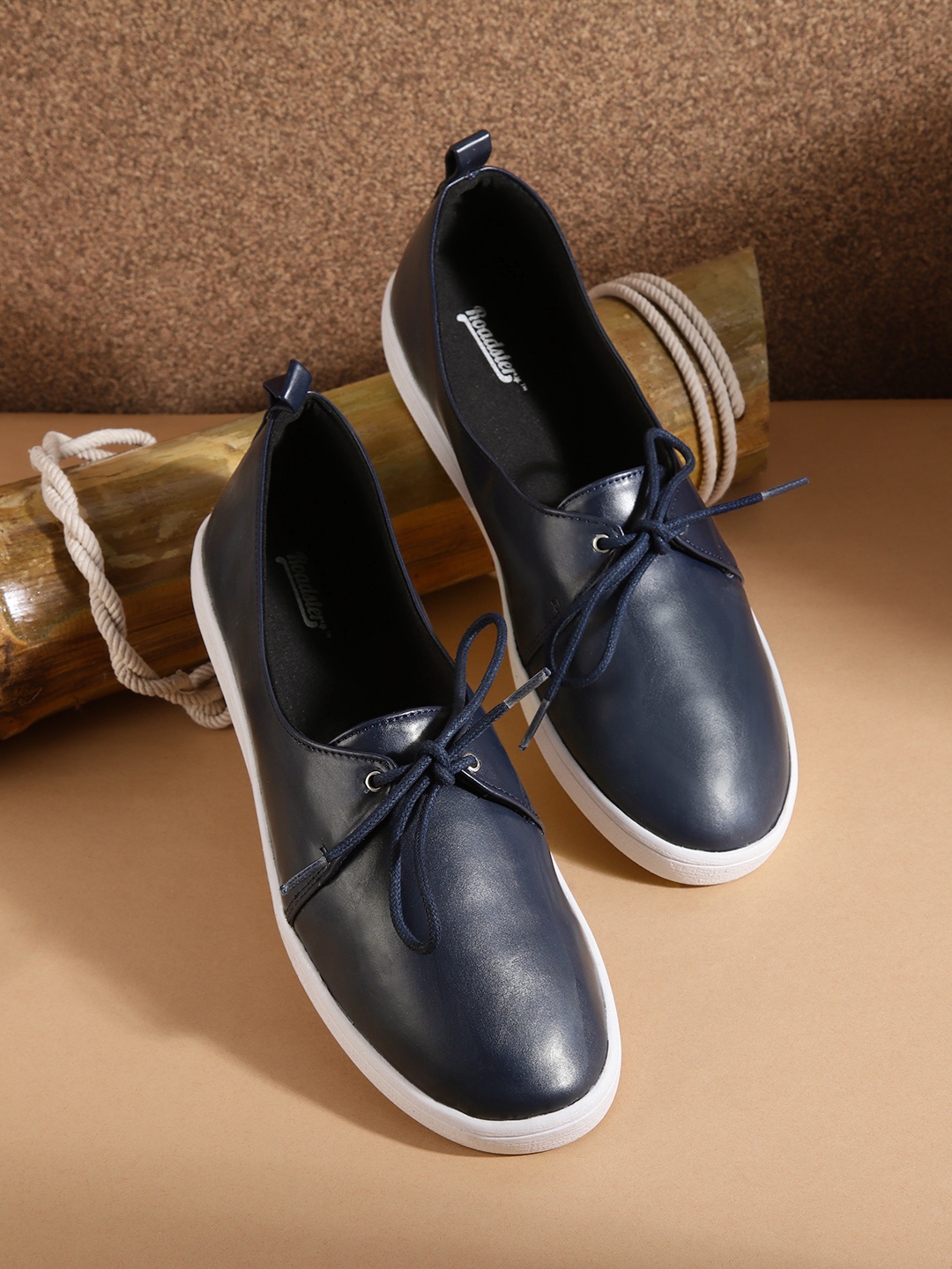 

Roadster Women Navy Blue Solid Sneakers