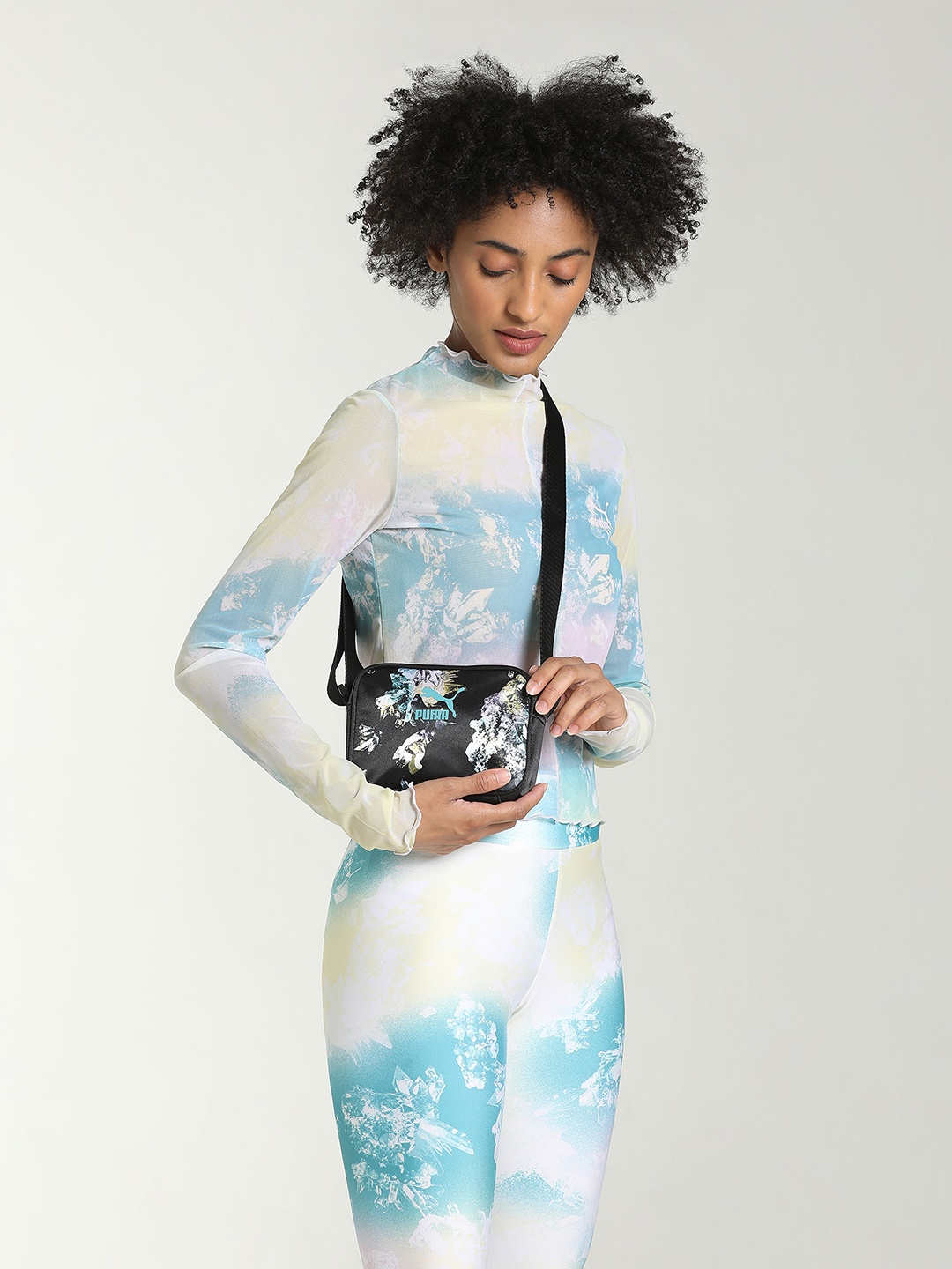 

Puma Black Abstract Printed Structured Cross Body Bag