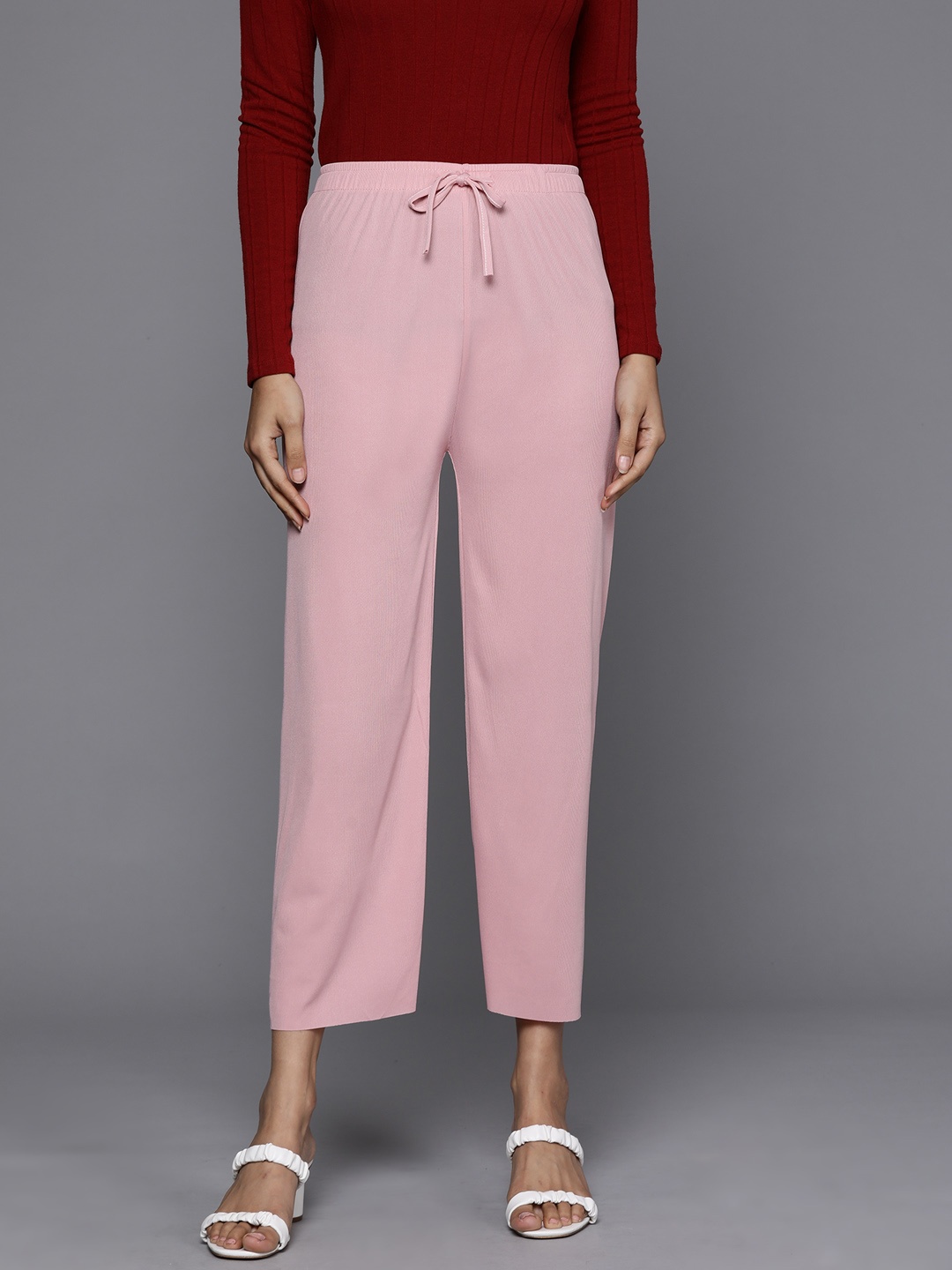 

JC Mode Women Pink Solid Trousers