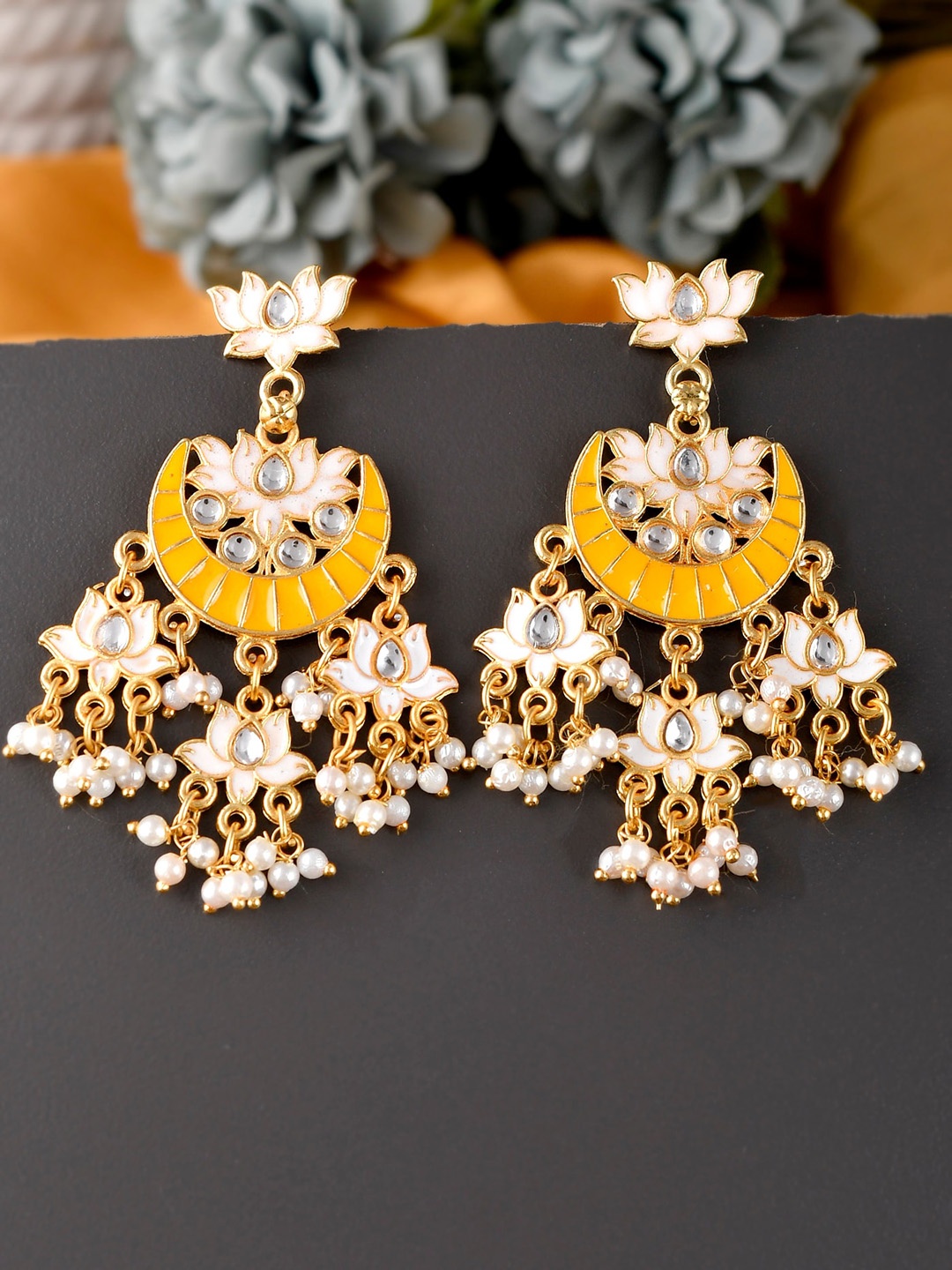

Silvermerc Designs Yellow Gold-Plated Paisley Shaped Chandbalis Earrings