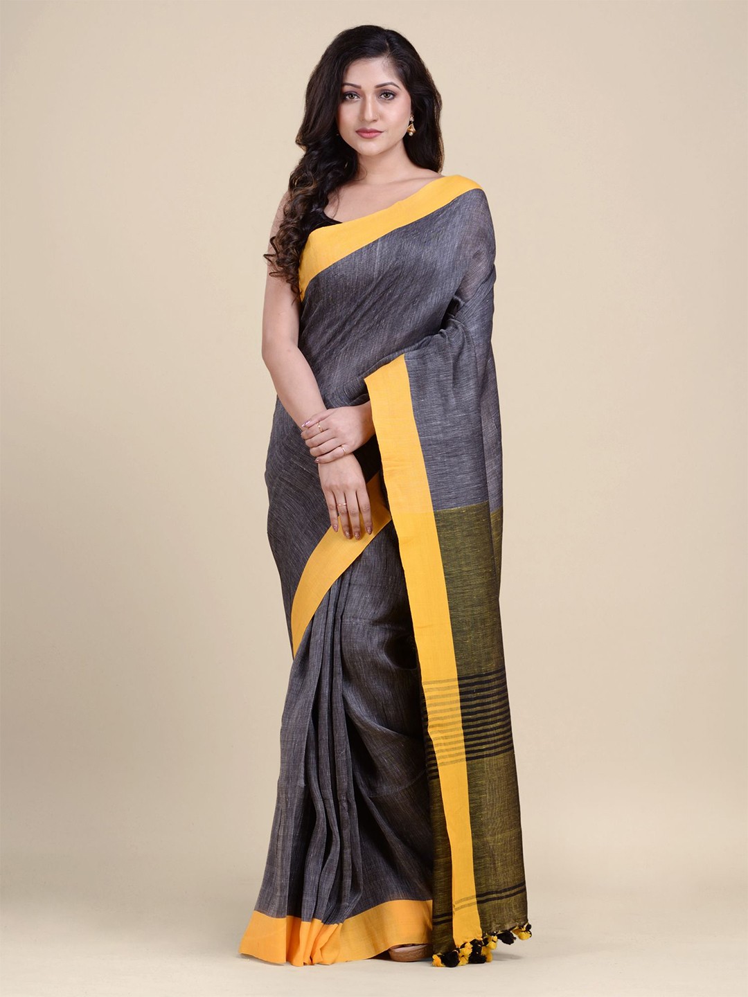 

Charukriti Grey & Yellow Pure Linen Saree