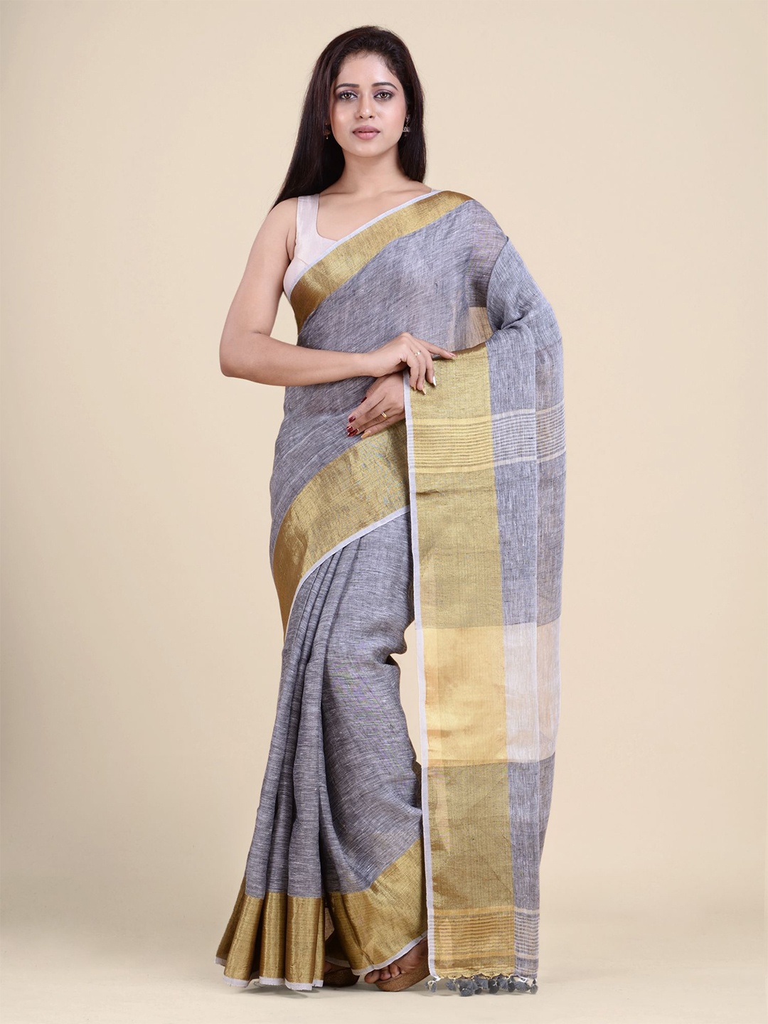 

Charukriti Grey & Gold-Toned Woven design Pure Linen Saree