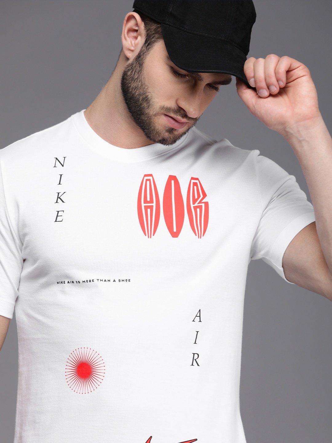 

Nike Men White Graphical Printed Sports T-shirt