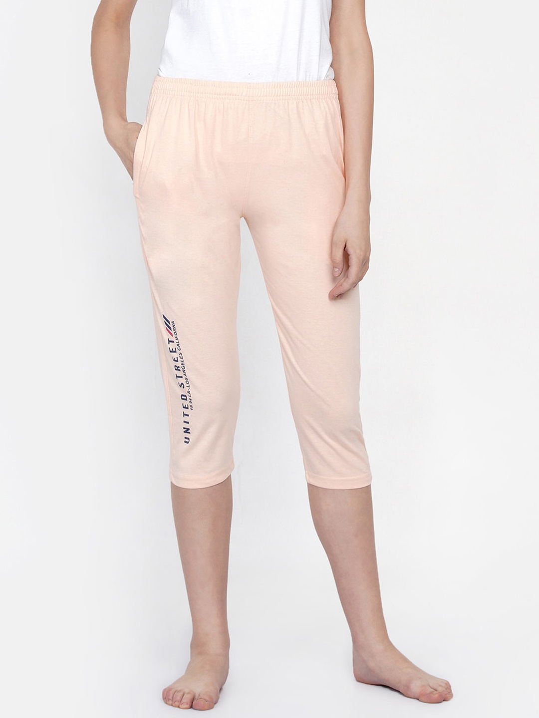 

FABNEST Women Cream-Coloured Printed Capris