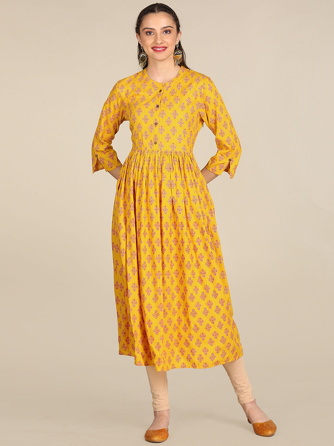 

Karigari Women Yellow Ethnic Motifs Printed Flared Sleeves Gotta Patti Anarkali Kurta