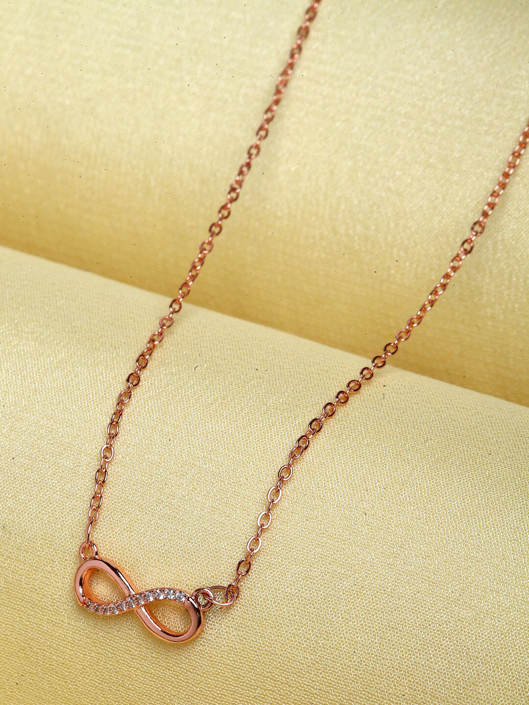 

Ferosh Rose Gold-Toned & White Stone Studded Infinity Pendant With Chain