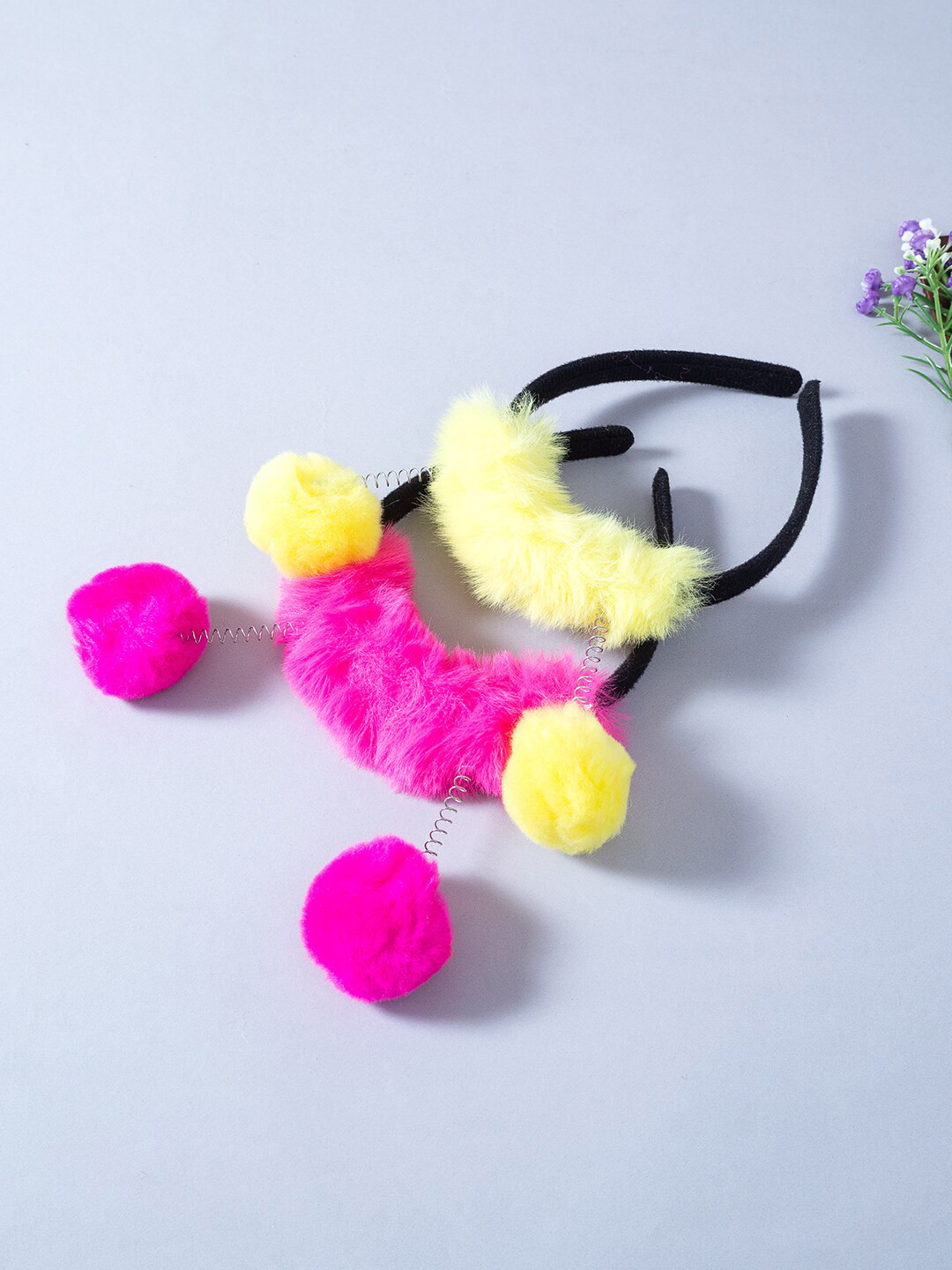 

Golden Peacock Girls Set Of 2 Yellow & Pink Fur Hairband
