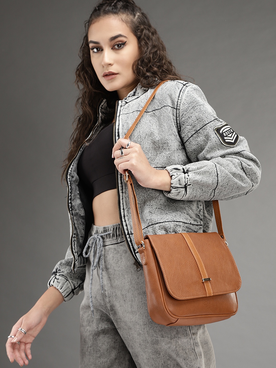 

Roadster Tan Textured PU Structured Sling Bag