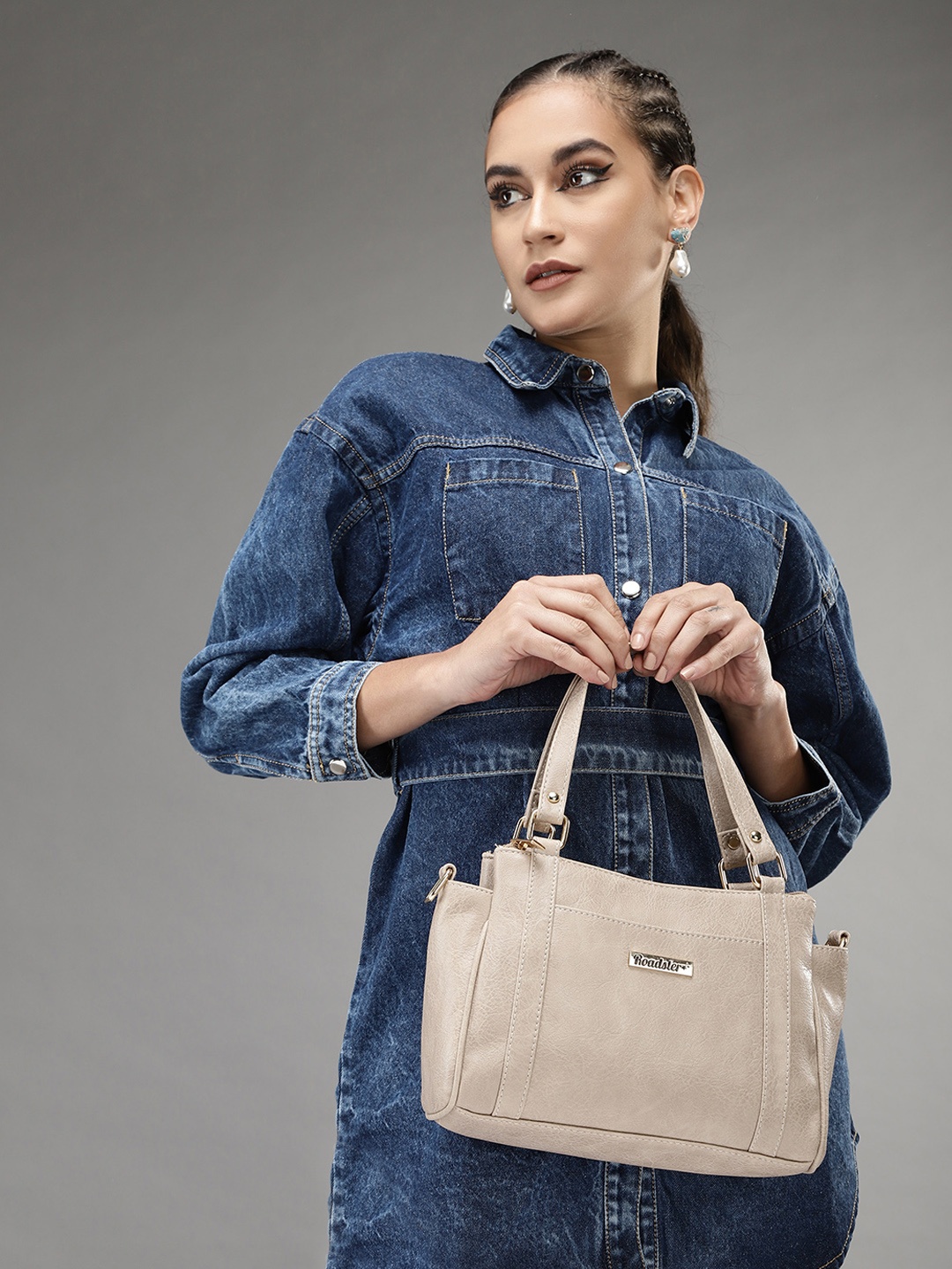 

Roadster Beige Textured Swagger Handheld Bag