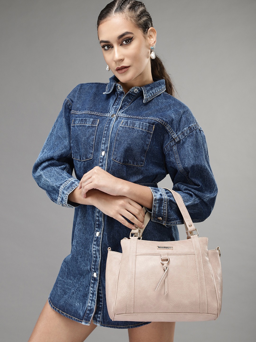 

Roadster Beige Textured Swagger Handheld Bag with Bow Detail