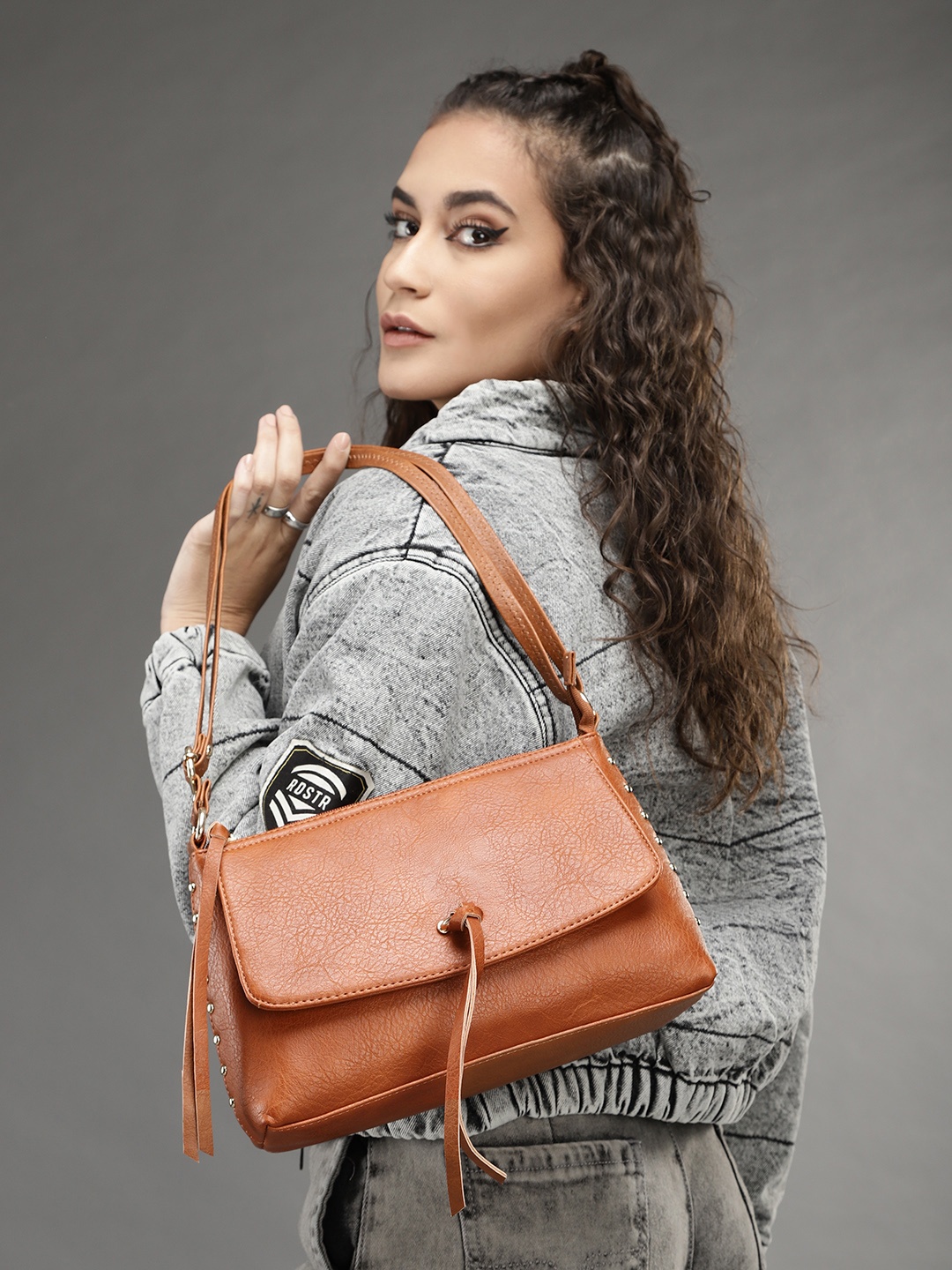 

Roadster Tan Textured PU Structured Sling Bag