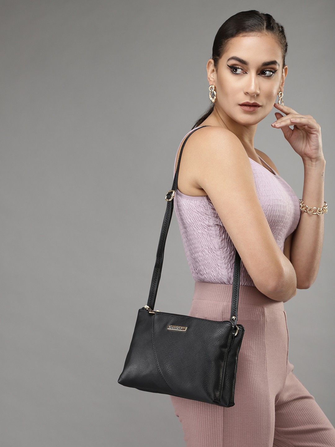 

Roadster Black Solid Sling Bag
