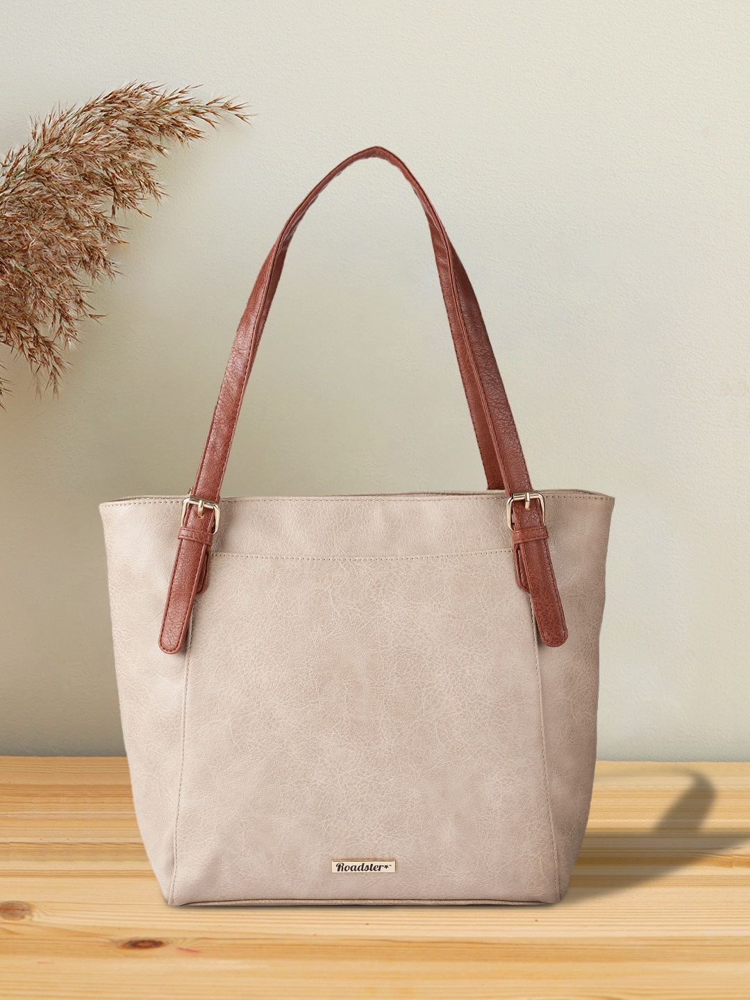 

Roadster Women Beige Textured Structured Shoulder Bag