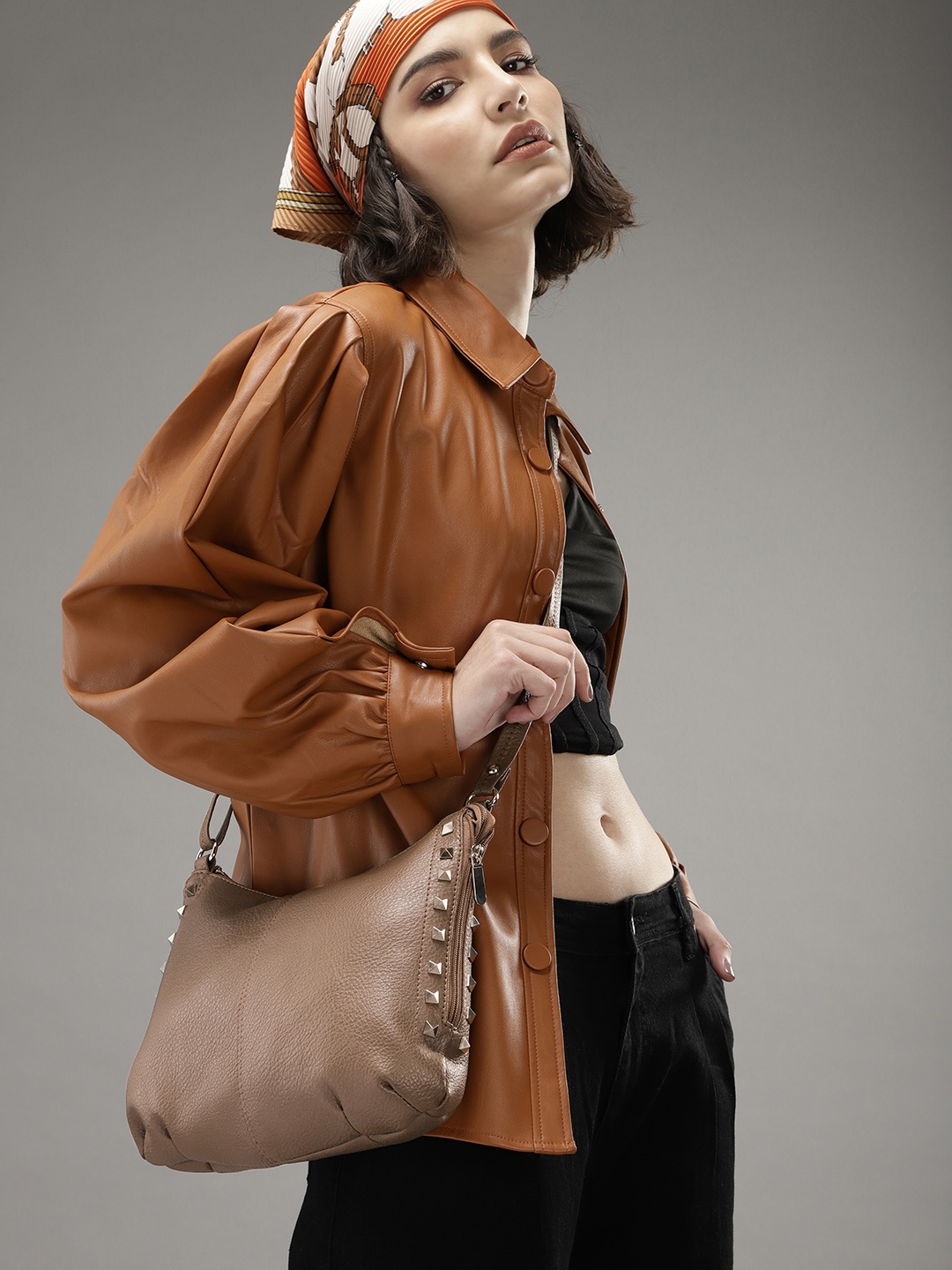 

Roadster Light Brown Embellished Sling Bag