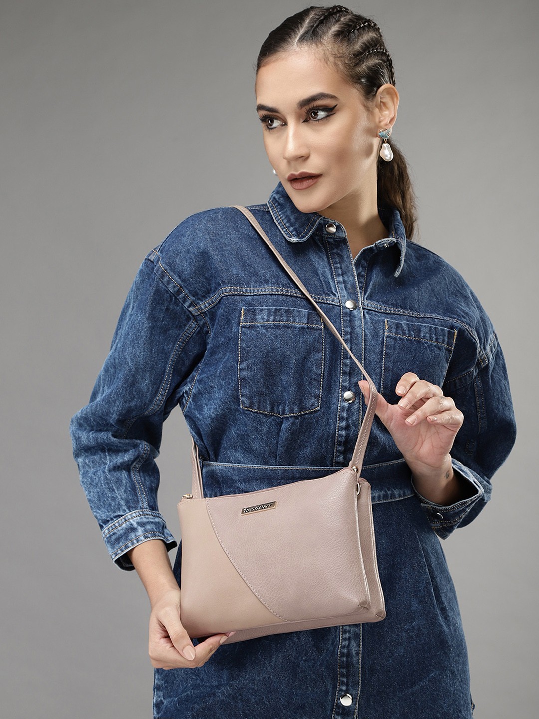 

Roadster Women Beige Textured Structured Sling Bag