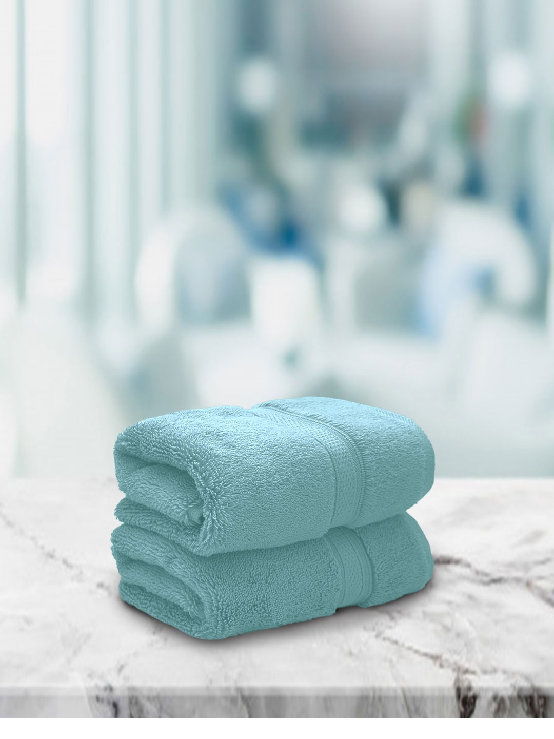 

Aura Set Of 2 Sea Green Solid 650 GSM Super Absorbent Pure Cotton Hand Towels