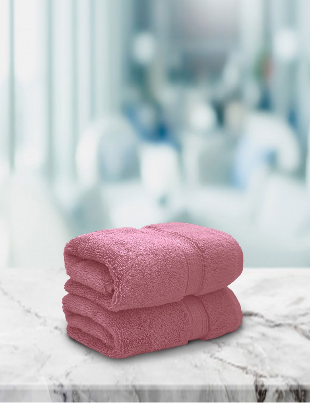 

Aura Set Of 2 Coral Pink Solid 650 GSM Super Absorbent Pure Cotton Hand Towels