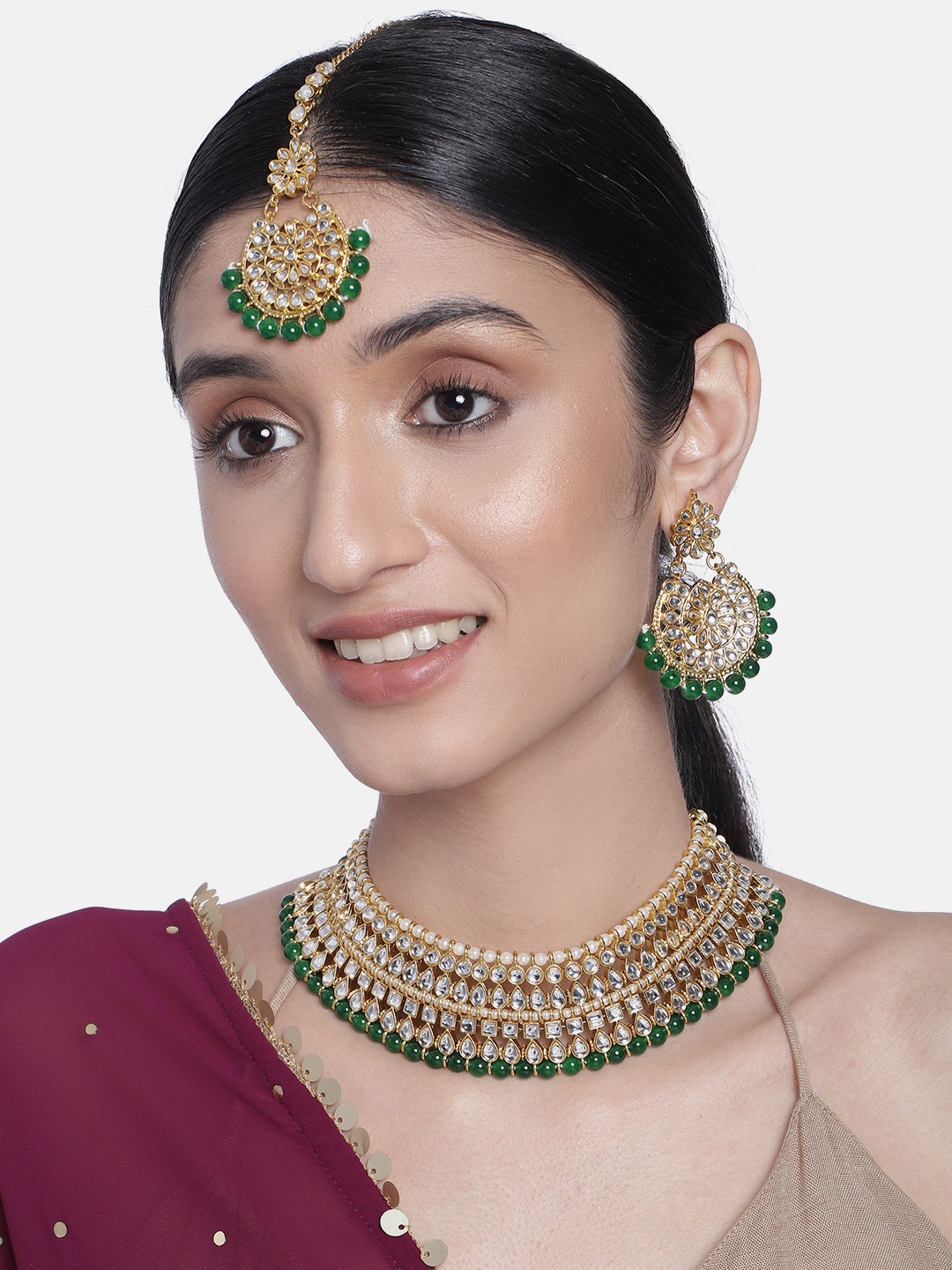 

Peora Off-White & Green Gold-Plated Kundan Studded Antique Jewellery Set