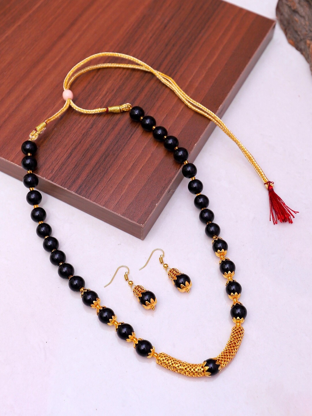 

Crunchy Fashion Gold-Plated Black Beaded Antique Jewellery Set