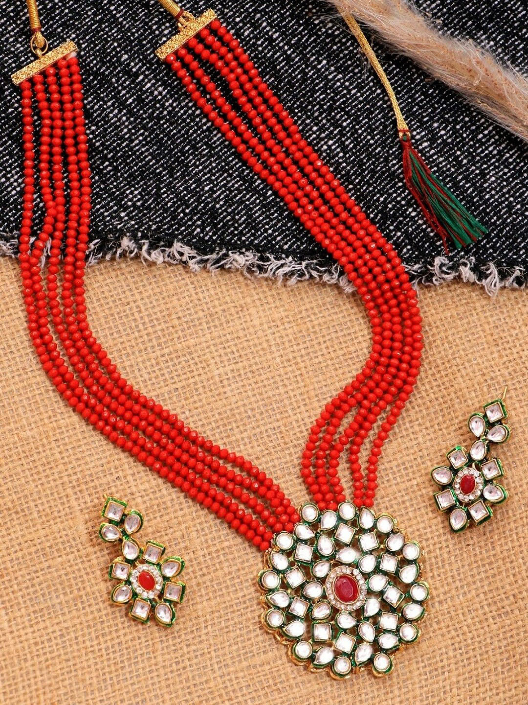 

Crunchy Fashion Gold-Plated White & Red Kundan Studded & Beaded Antique Jewellery Set