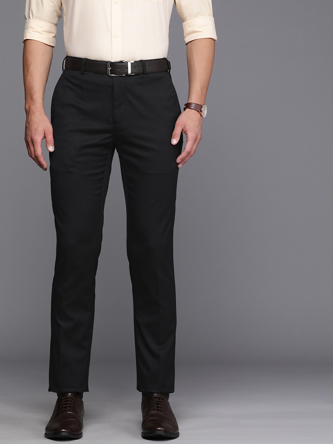 

Raymond Men Blue Solid Mid-Rise Slim Fit Formal Trousers