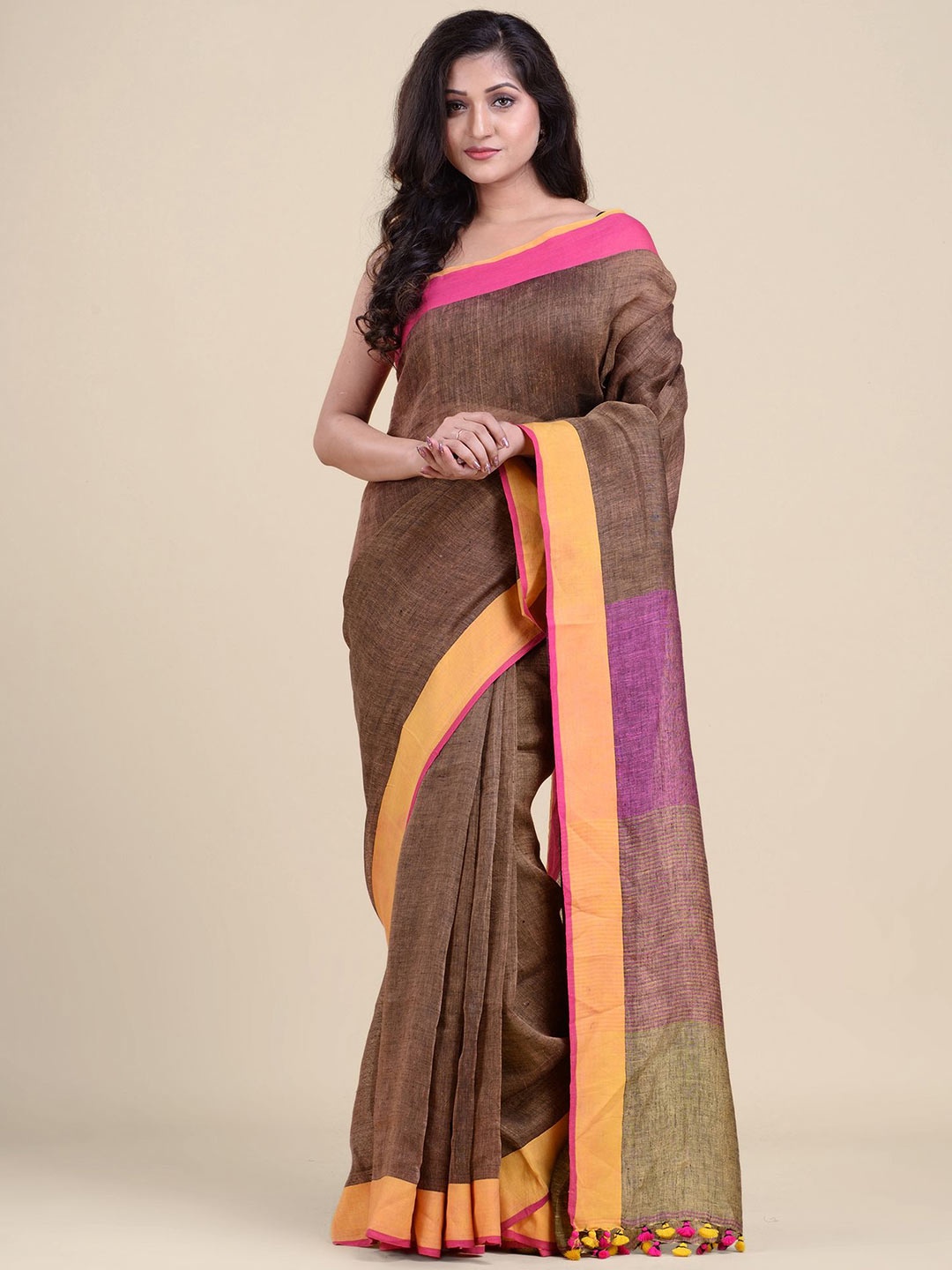 

Charukriti Brown Solid Handwoven Soft Linen saree