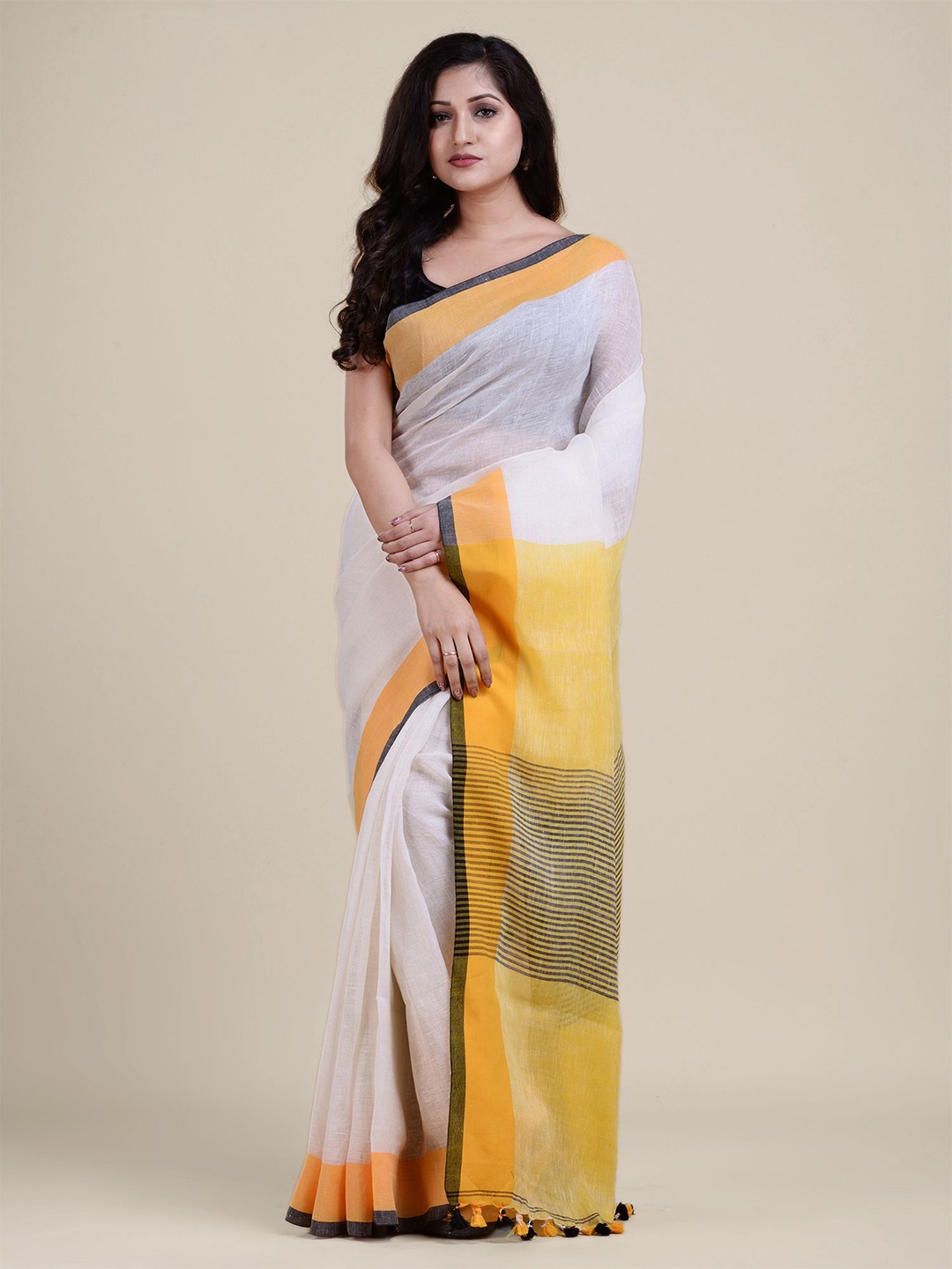 

Charukriti White & Yellow Pure Linen Saree