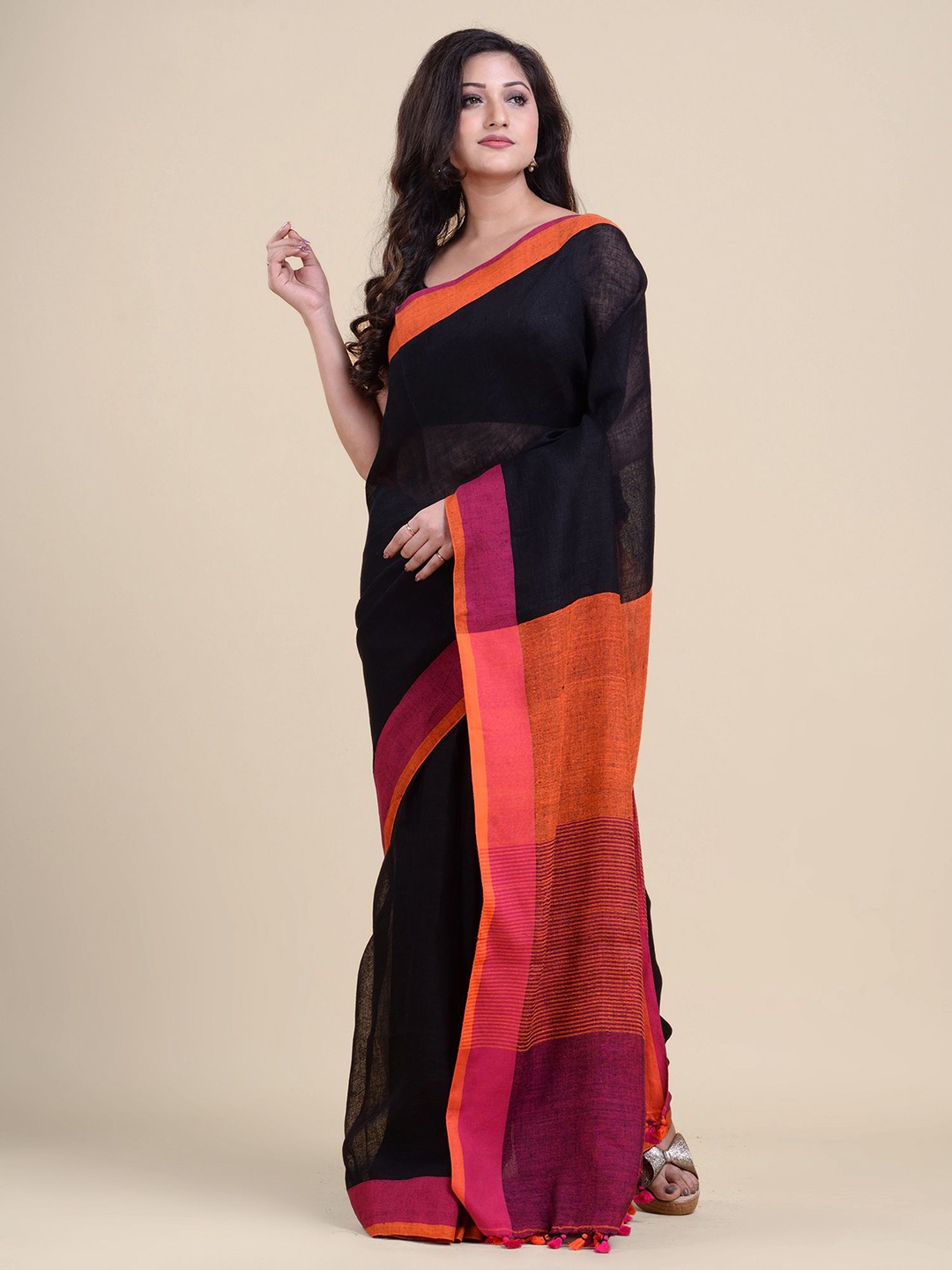 

Charukriti Black & Orange Pure Linen Saree