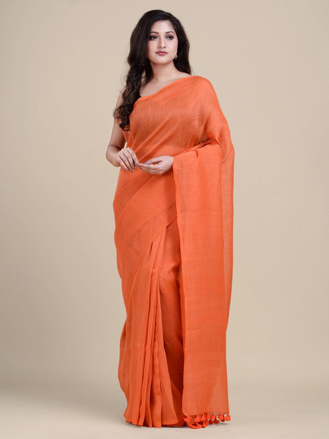 

Charukriti Women Orange Solid Handwoven Soft Linen saree