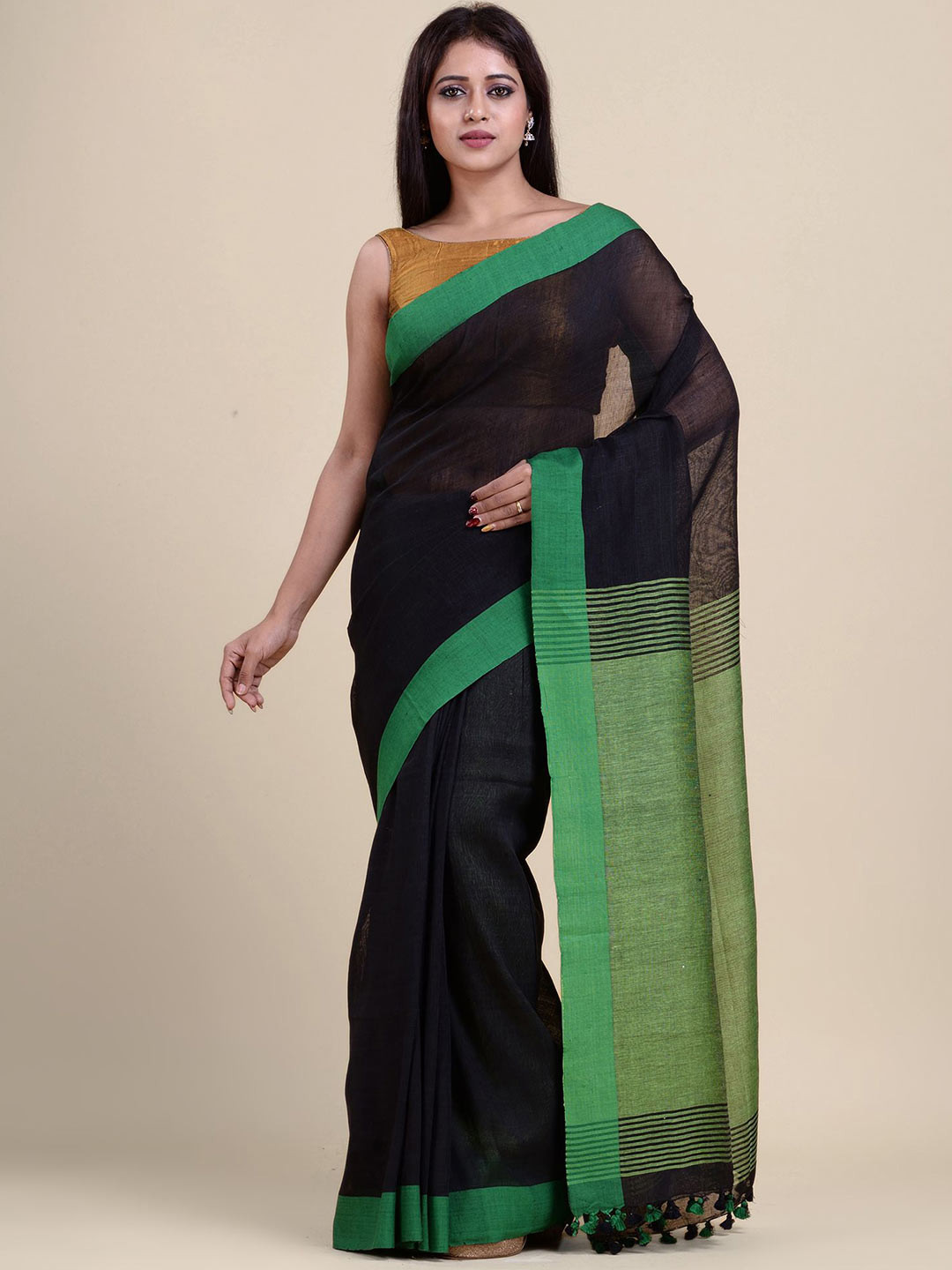 

Charukriti Black & Green Pure Linen Saree