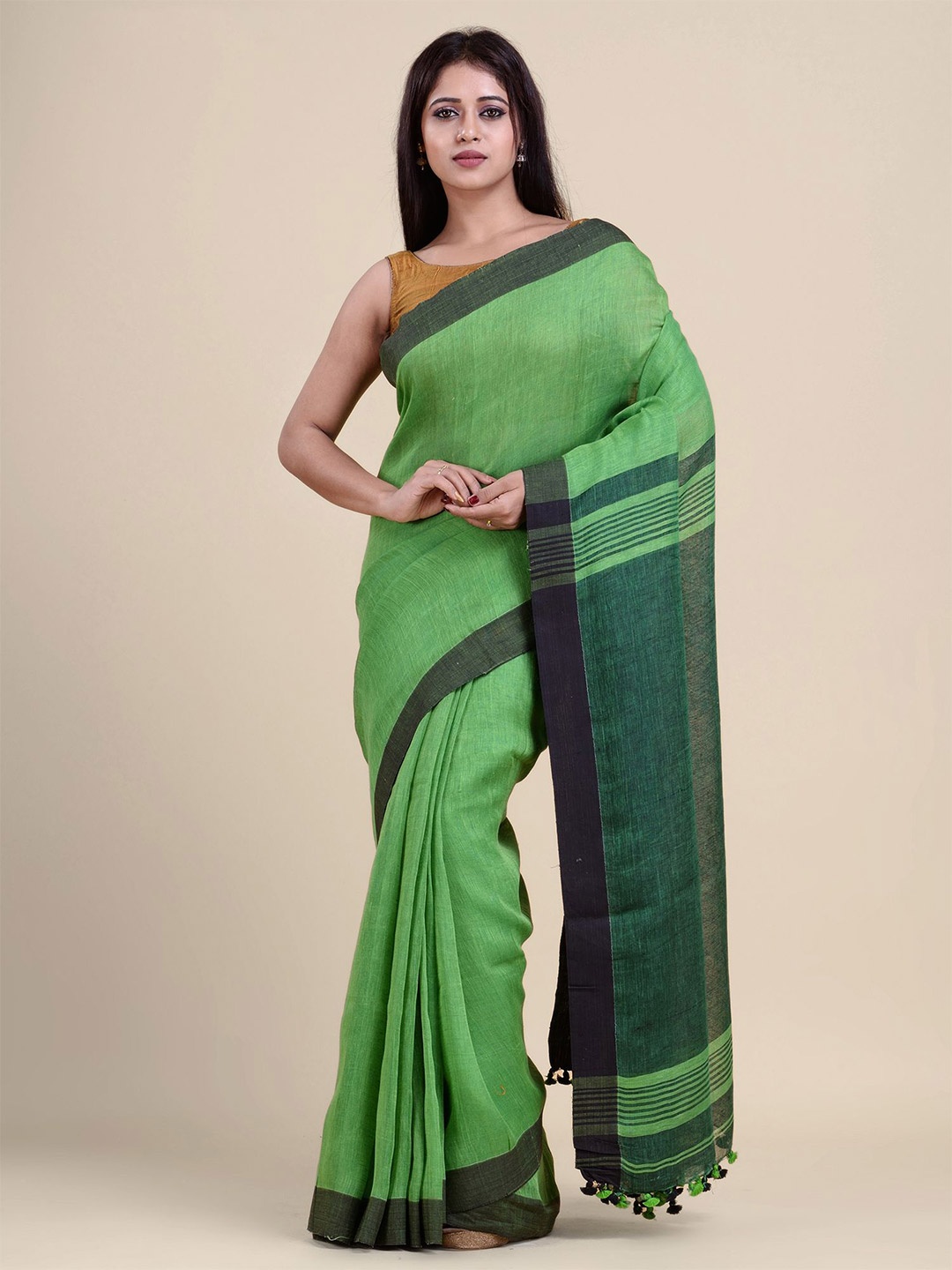 

Charukriti Green & Grey Pure Linen Saree