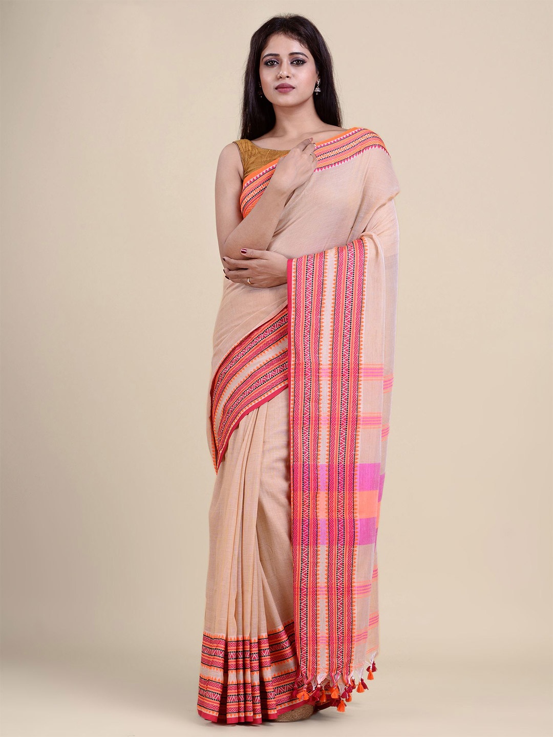 

Charukriti Beige & Peach-Coloured Saree