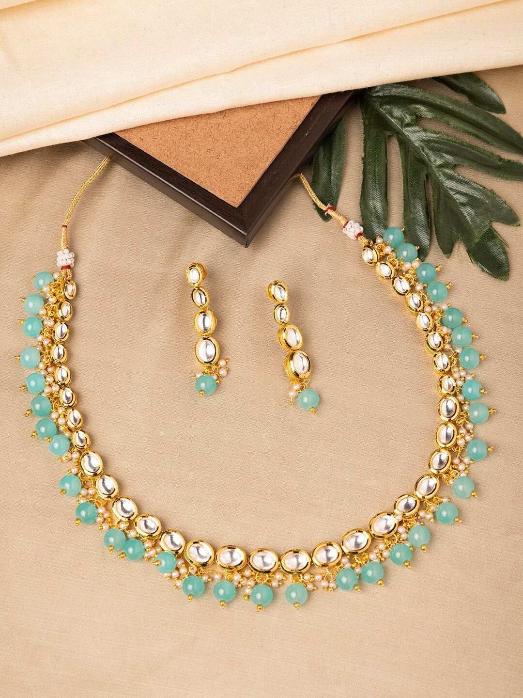 

INDYA Gold-Plated & Green Kundan Earring Necklace Set