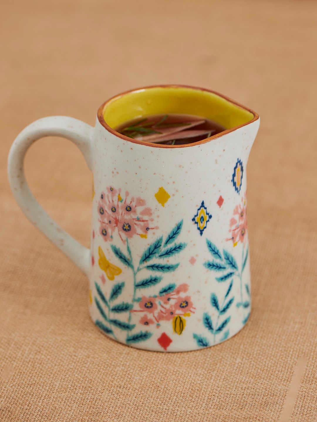 

Chumbak Off-White & Green Floral Print Ceramic Farmhouse Pitcher