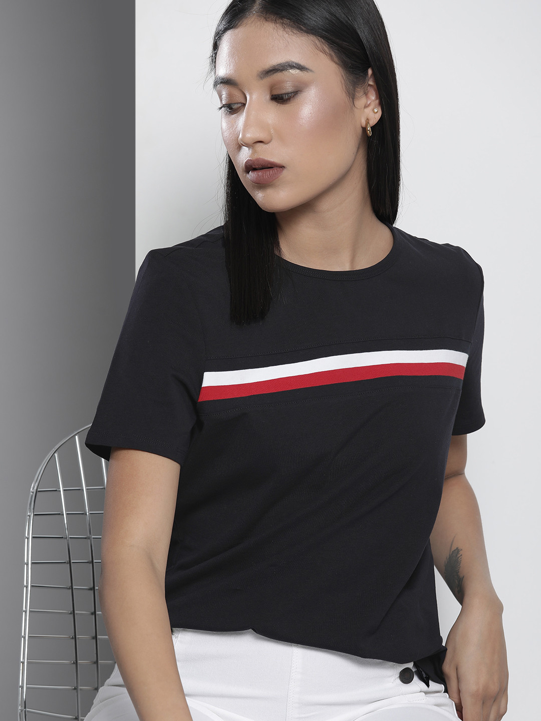 

Tommy Hilfiger Women Navy Blue & White Striped Round NeckT-shirt