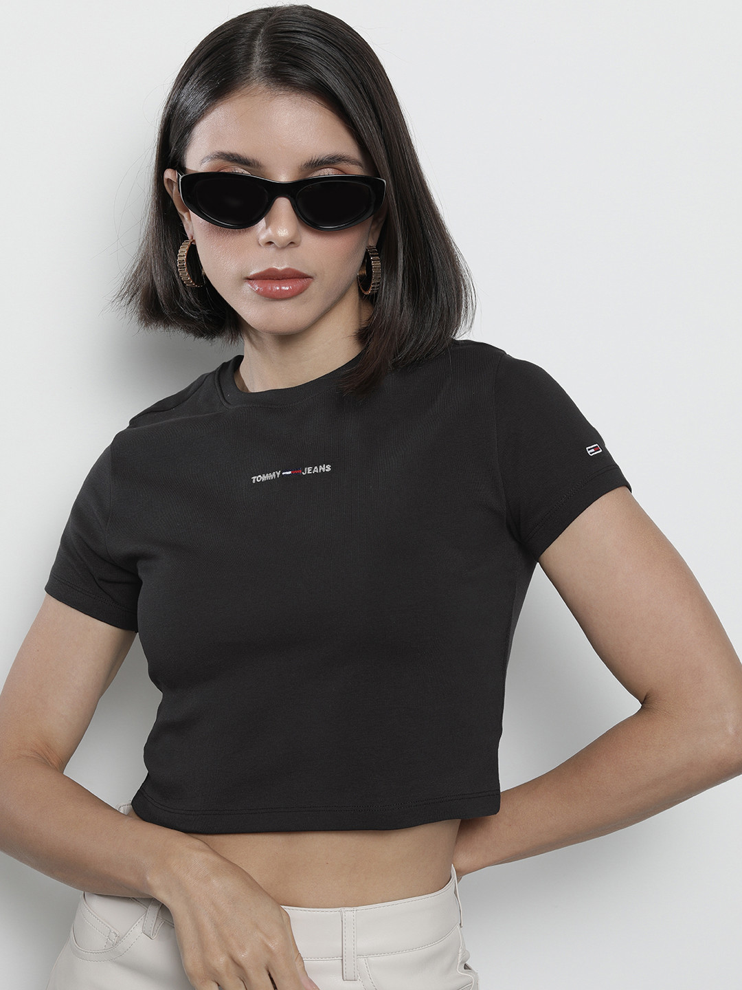 

Tommy Hilfiger Women Black Solid Round Neck Regular Sleeves Embroidered Crop T-shirt